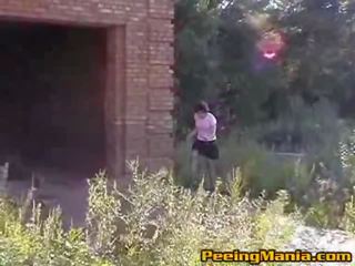 Damsel Wearing Black Stockings Lifts Skirt And Pees